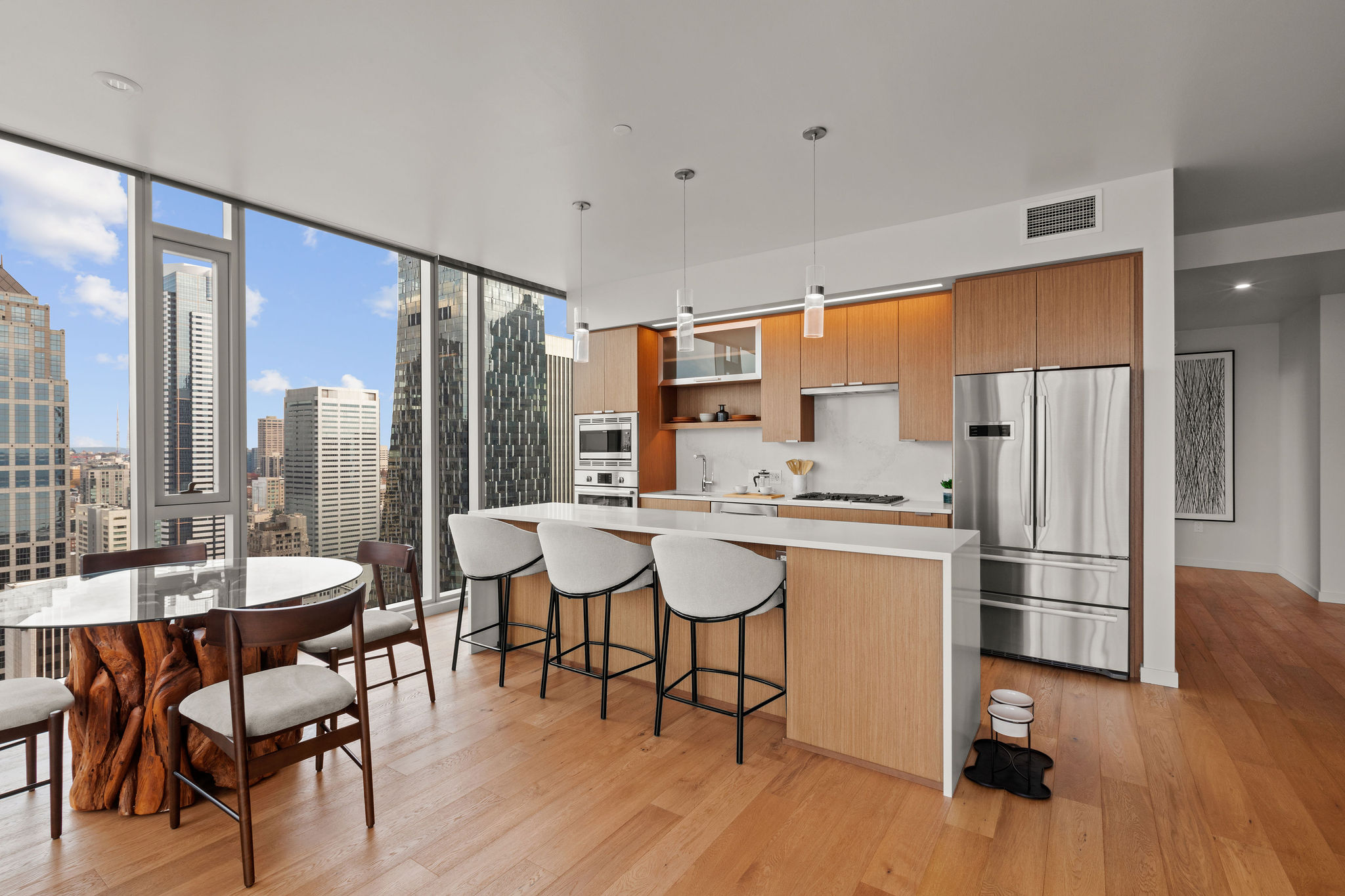 Spacious Penthouse Floor Plans Kitchen with island and refrigerator