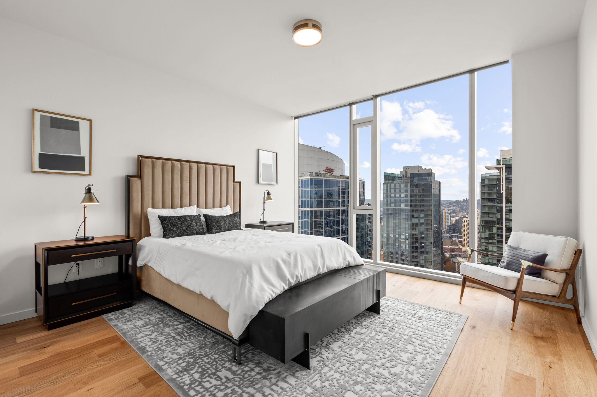 Penthouse Bedroom Bedrooms feature recessed lighting with elegant ceiling fixtures