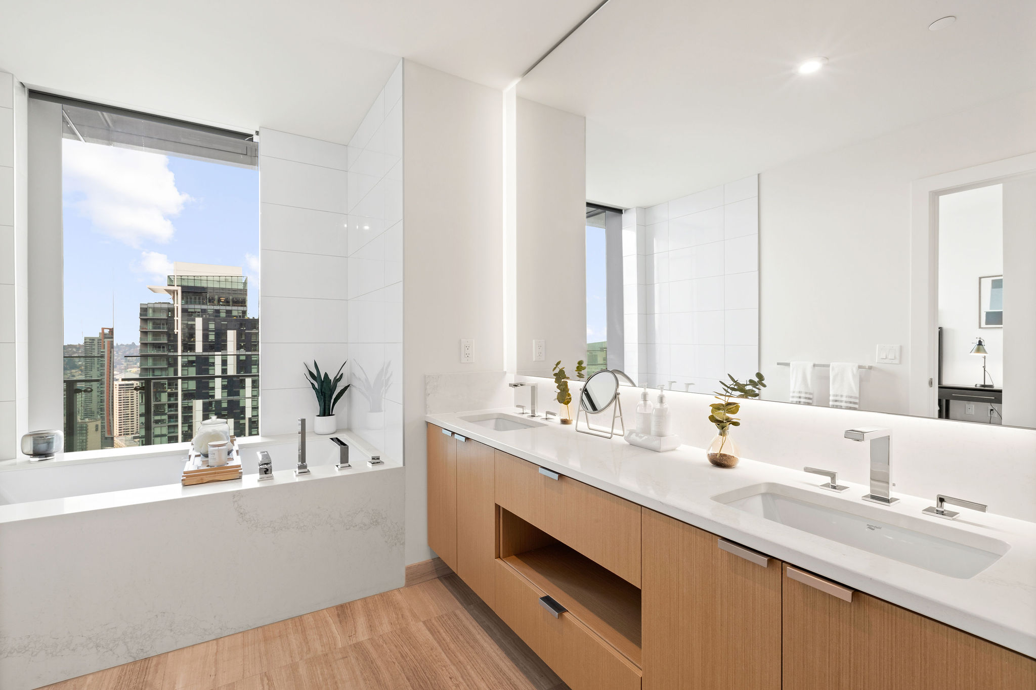 Penthouse Living Bathroom Bathroom with soaking tub and duel vanity