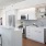 all white kitchen with natural light